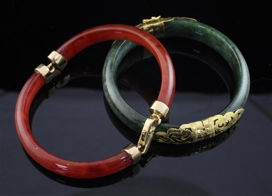 Two gold mounted bangles.